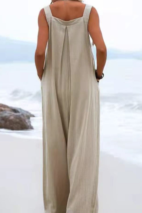 Chique Overall mit breiten Hosenbeinen und Knopfdetails