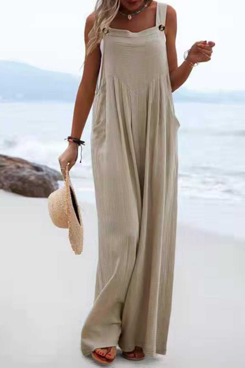 Chique Overall mit breiten Hosenbeinen und Knopfdetails