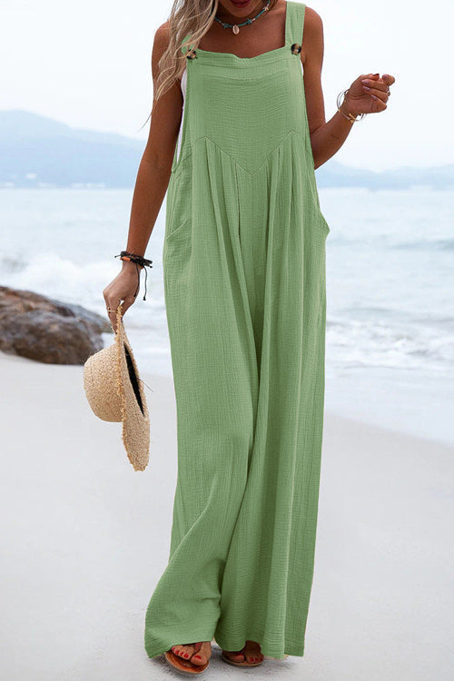 Chique Overall mit breiten Hosenbeinen und Knopfdetails