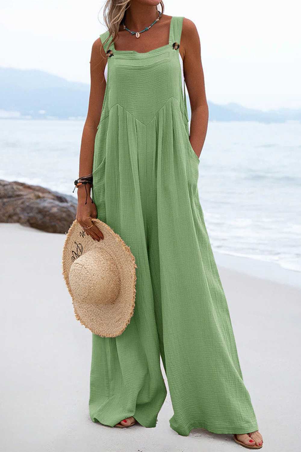 Chique Overall mit breiten Hosenbeinen und Knopfdetails