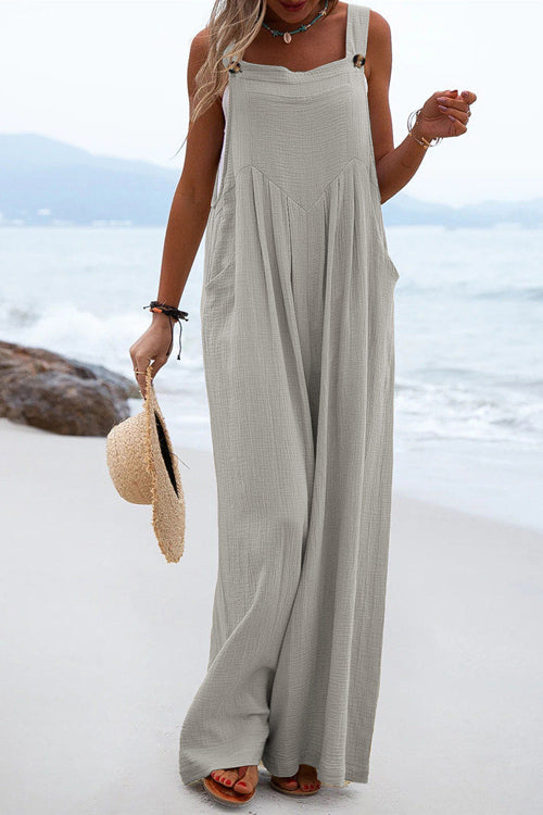 Chique Overall mit breiten Hosenbeinen und Knopfdetails