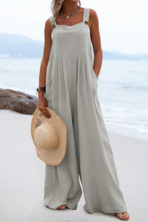 Chique Overall mit breiten Hosenbeinen und Knopfdetails