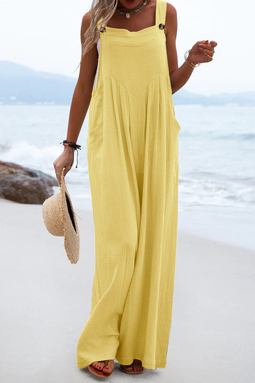 Chique Overall mit breiten Hosenbeinen und Knopfdetails