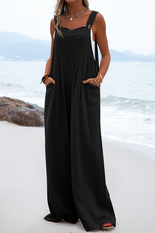 Chique Overall mit breiten Hosenbeinen und Knopfdetails