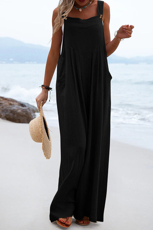 Chique Overall mit breiten Hosenbeinen und Knopfdetails
