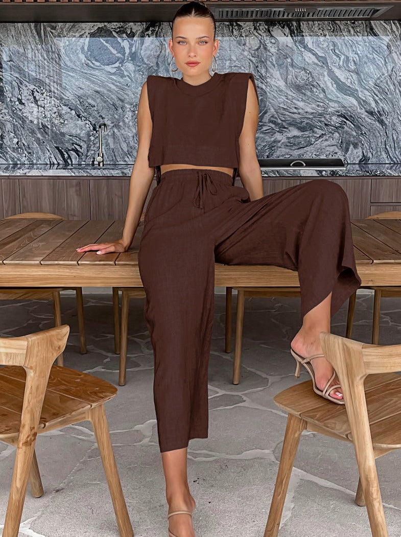 Lässiges zweiteiliges Set aus Leinenhose und bauchfreiem Top