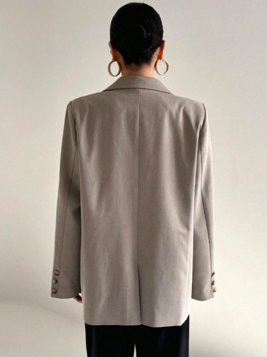 Blazer mit markanten Schultern und lässigen Taschen