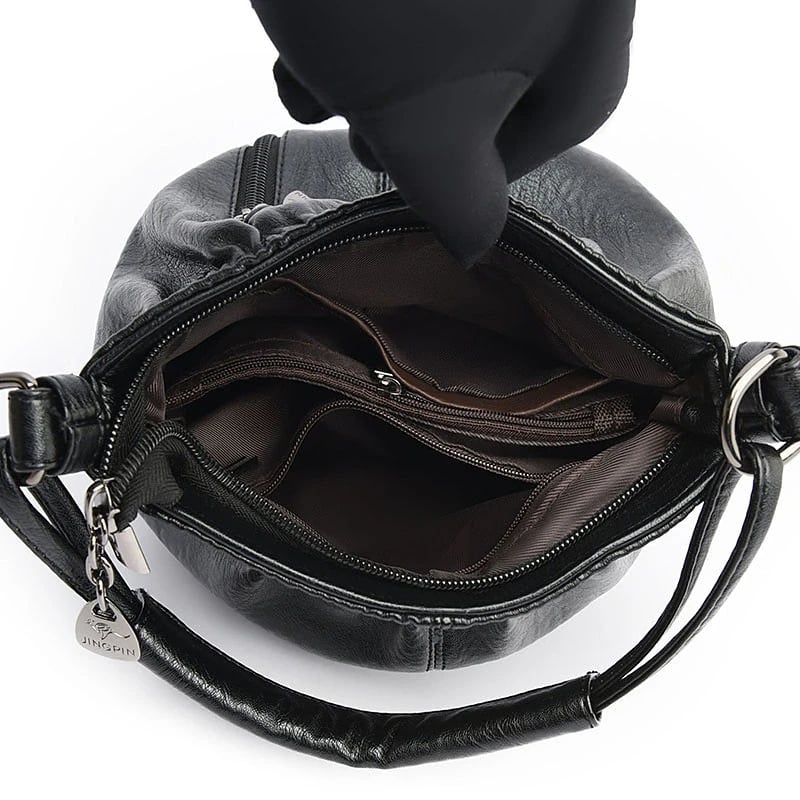 Vintage-Umhängetasche aus weichem Leder mit handgefertigten Details