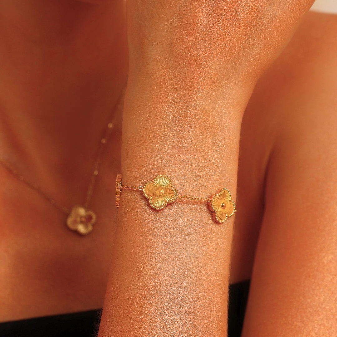 GLÜCKLICHES QUADRIFOGLIO-ARMBAND AUS GOLD