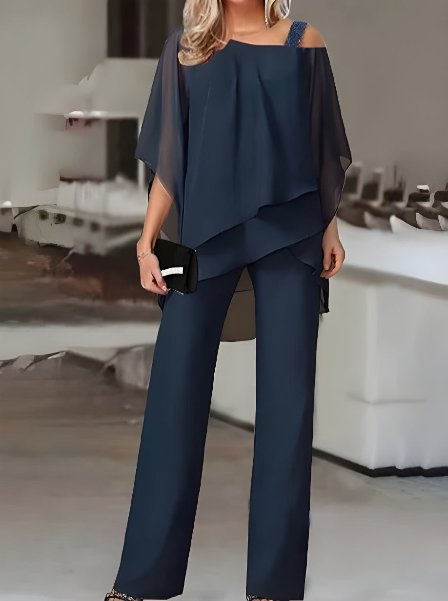 Luxuriöses, asymmetrisches Set aus schulterfreier Bluse und Hose