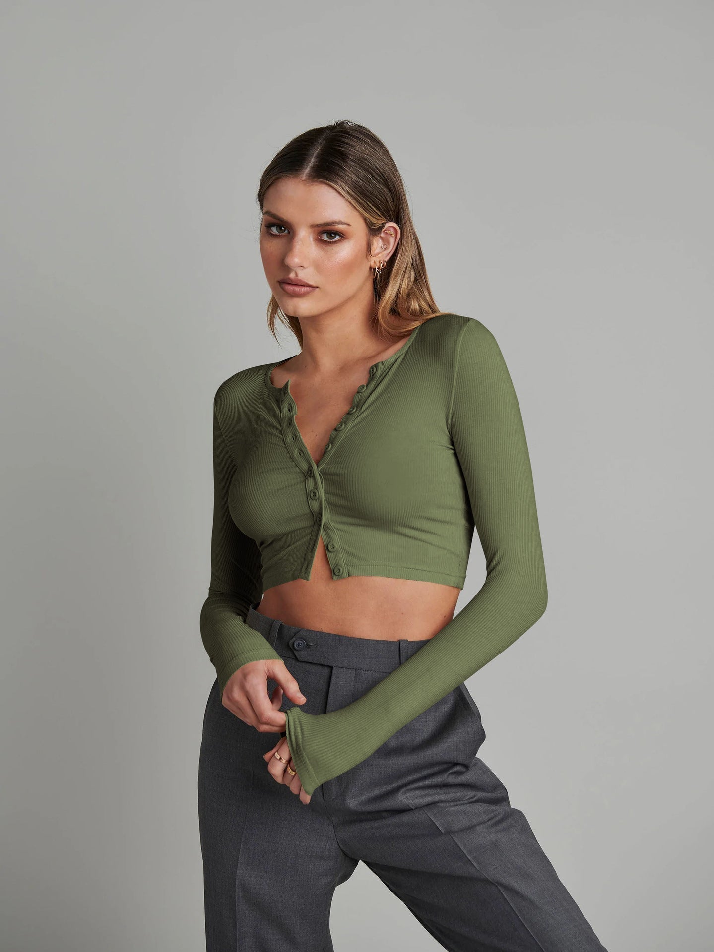 Grüner, langärmliger Strickjacke mit Knöpfen