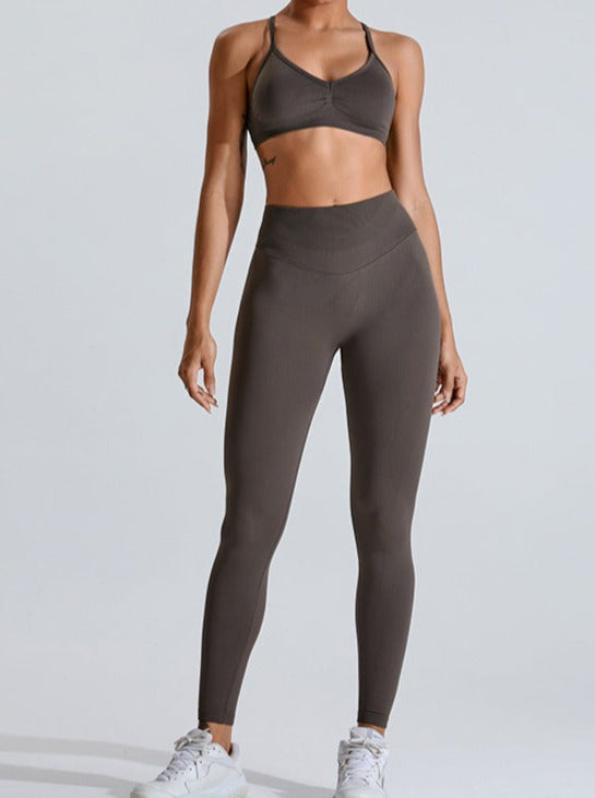 Graue Sporthose mit hoher Taille zum Heben des Bauches