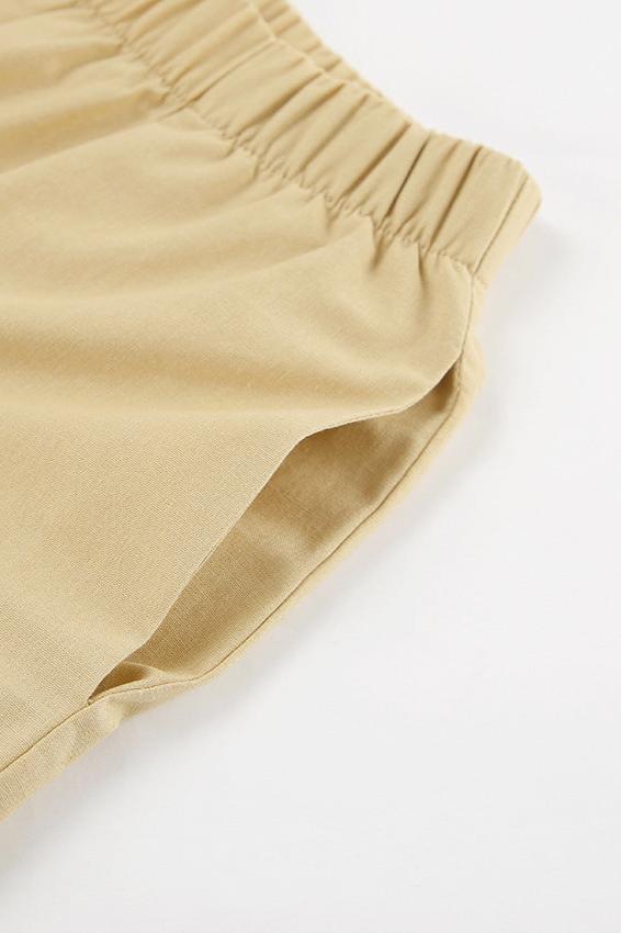 Trendiges, einfarbiges Set mit langärmeliger Wickelbluse und Hose