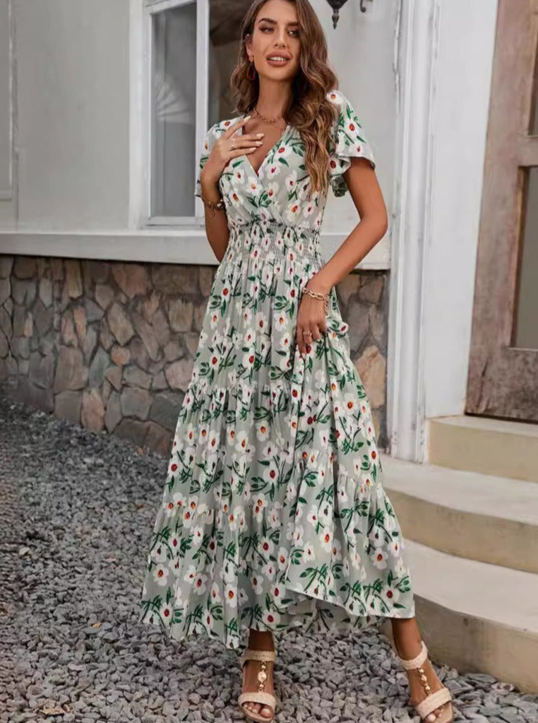 Ausgestelltes Kleid mit V-Ausschnitt und Blumenmuster im Retro-Stil