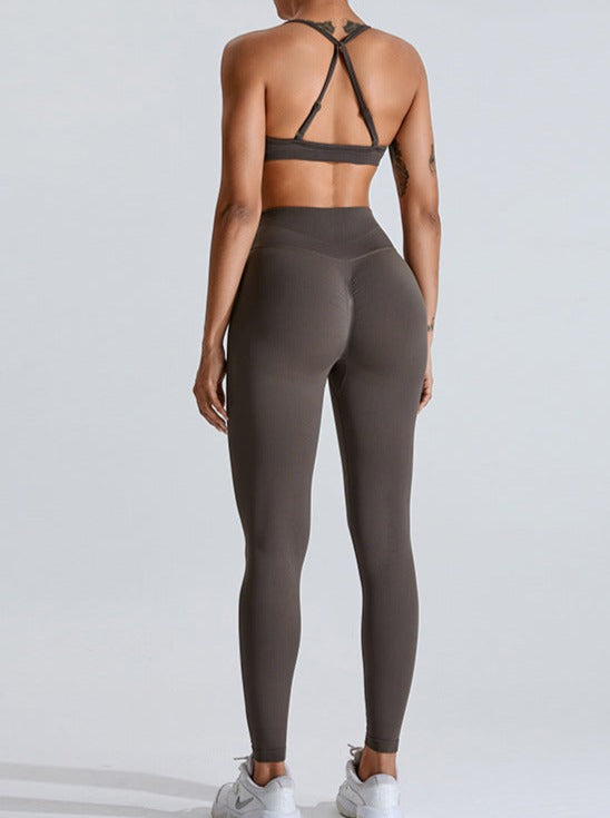 Graue Sporthose mit hoher Taille zum Heben des Bauches