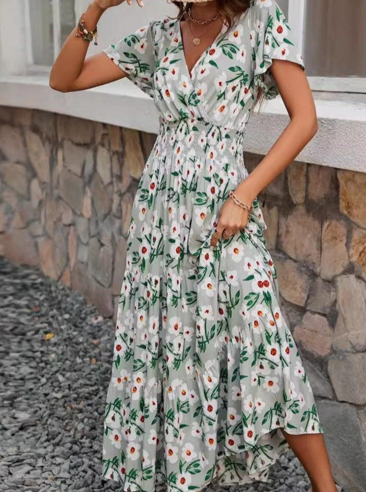 Ausgestelltes Kleid mit V-Ausschnitt und Blumenmuster im Retro-Stil
