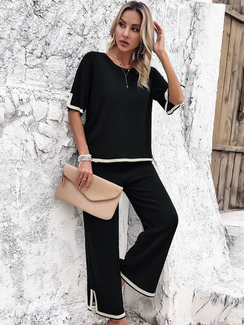 Schwarzes, lässiges, kurzärmliges Strickhemd und Hose