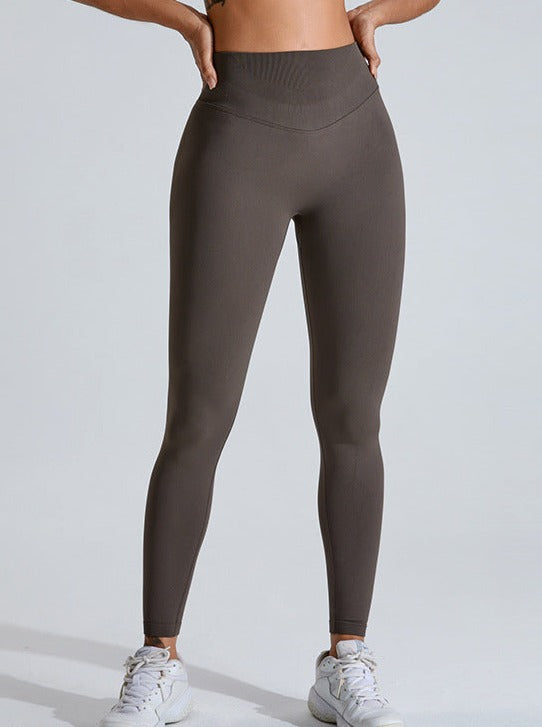 Graue Sporthose mit hoher Taille zum Heben des Bauches