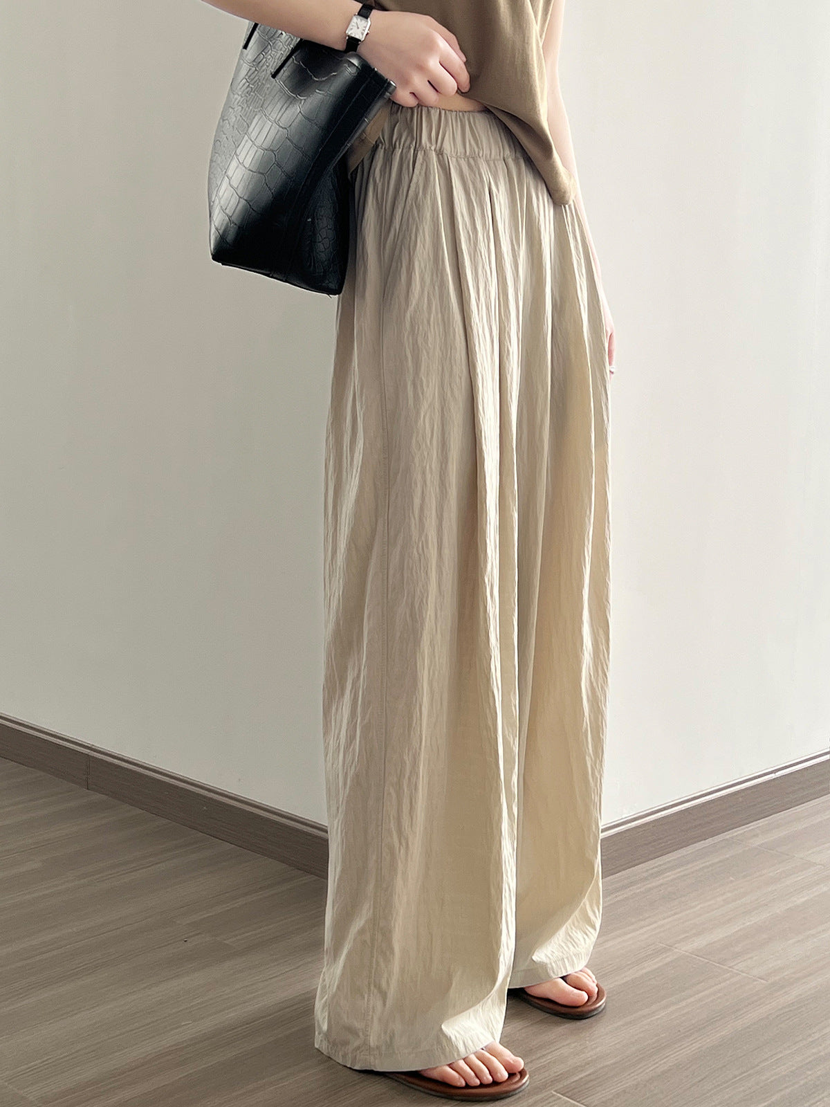 Aprikosenfarbene, lockere Hose mit weitem Bein
