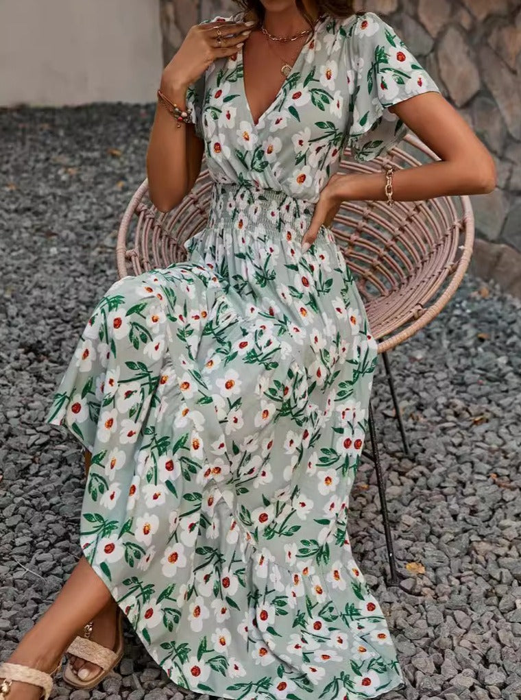 Ausgestelltes Kleid mit V-Ausschnitt und Blumenmuster im Retro-Stil