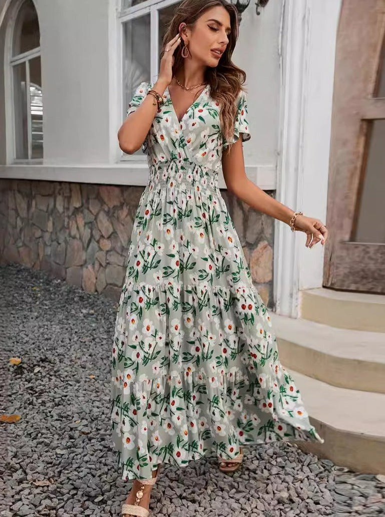 Ausgestelltes Kleid mit V-Ausschnitt und Blumenmuster im Retro-Stil