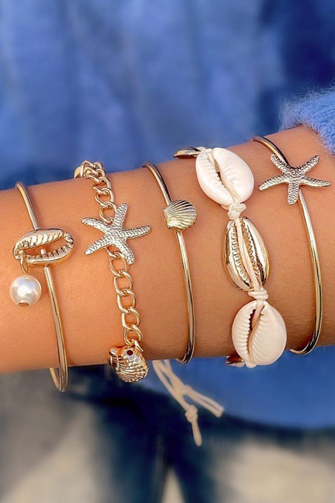 MUSCHELN UND SEESTERNE ARMBAND