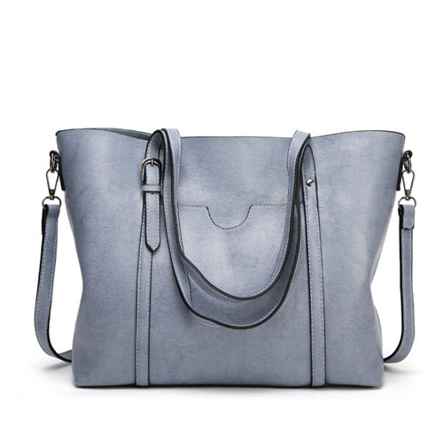 Mika™  - Stilvolle handgefertigte Ledertasche