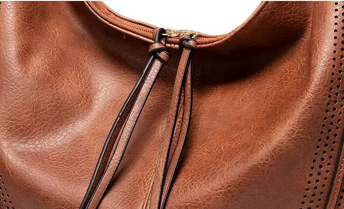 Minervas Klassische Vielseitigkeit | Vintage Ledertasche