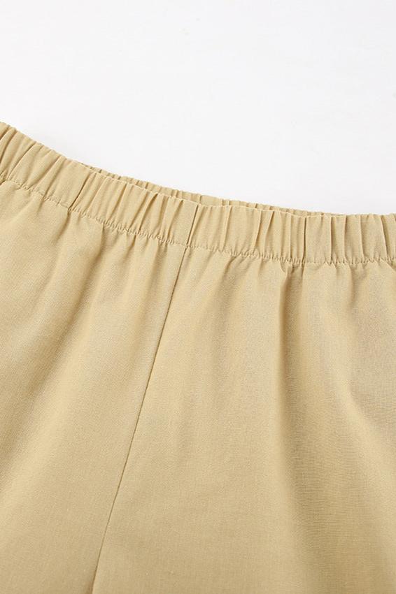 Trendiges, einfarbiges Set mit langärmeliger Wickelbluse und Hose