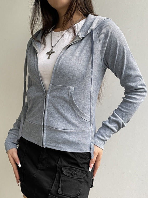 Einfarbige Jacke mit Reißverschluss und Kordelzug und Taschen