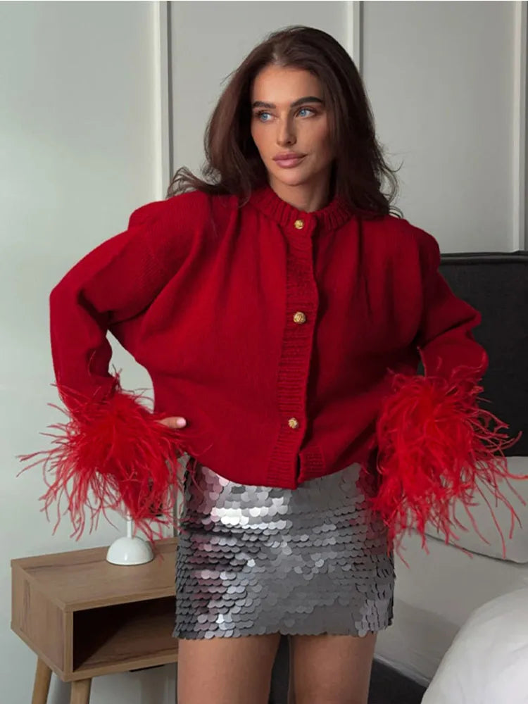 Mei | Roter patchwork-strick-cardigan mit federdetails