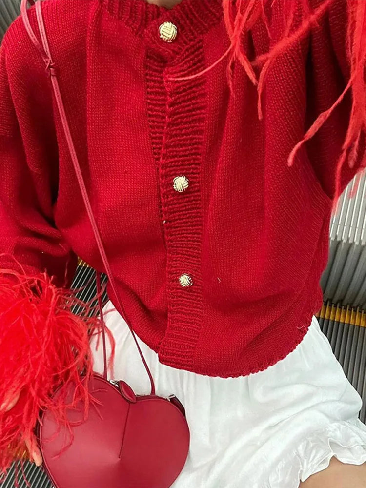 Mei | Roter patchwork-strick-cardigan mit federdetails